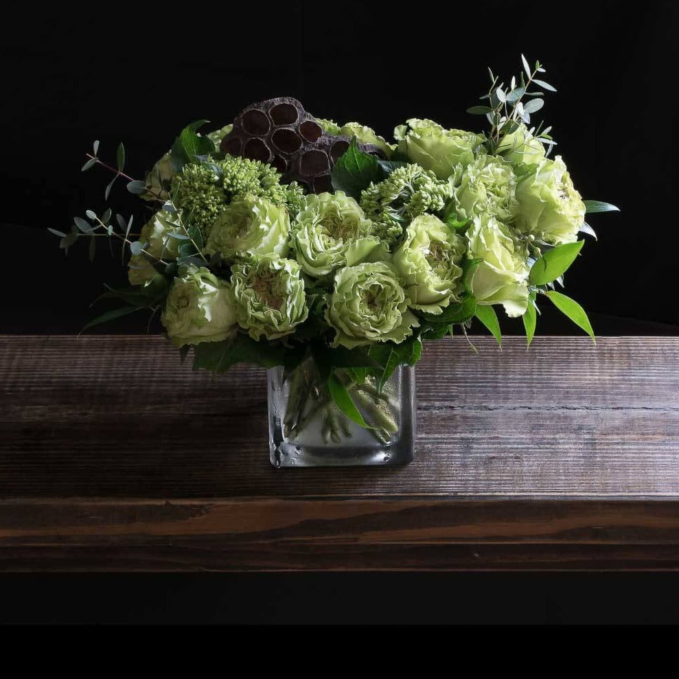 Unique floral arrangement with all green roses