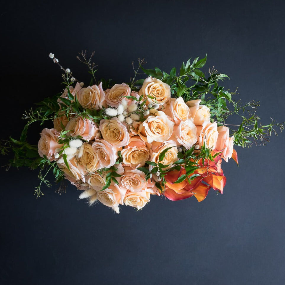 Peach roses floral arrangement picture from the top