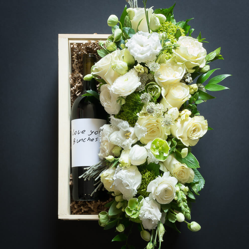 Floral Basket Gift Box boutique floral arrangemt with white roses, white tulips and organic red sangiovese wine bottle