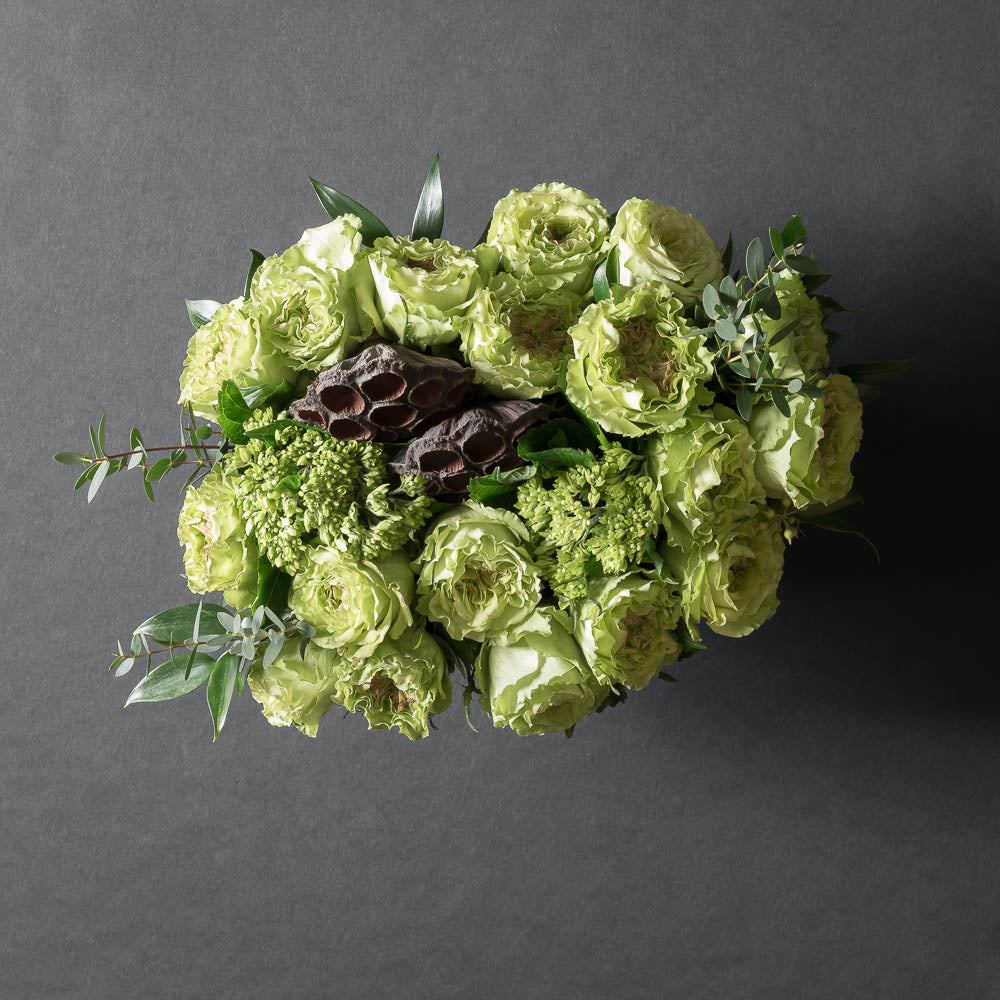 Unique floral arrangement with all green roses
