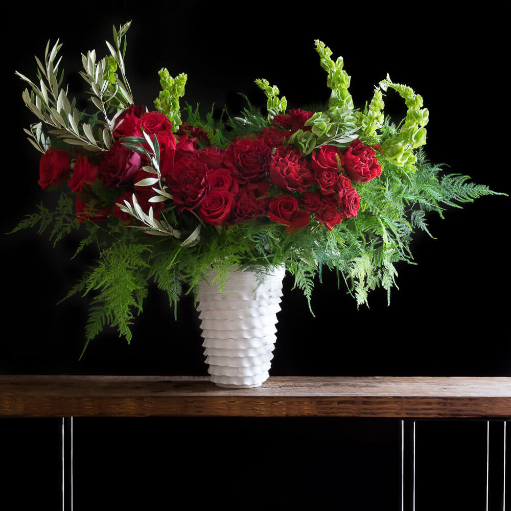 Red roses tall boutique floral arrangement