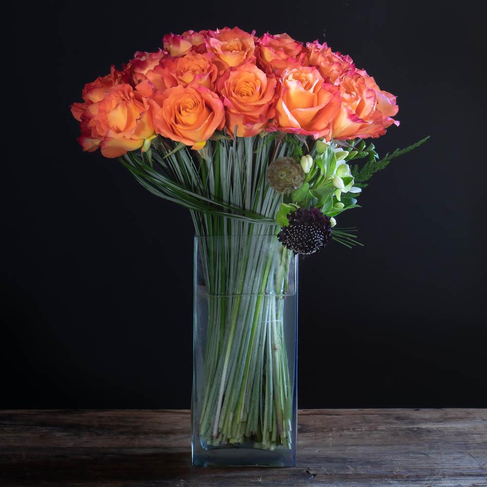 Orange roses long stem flower arrangement