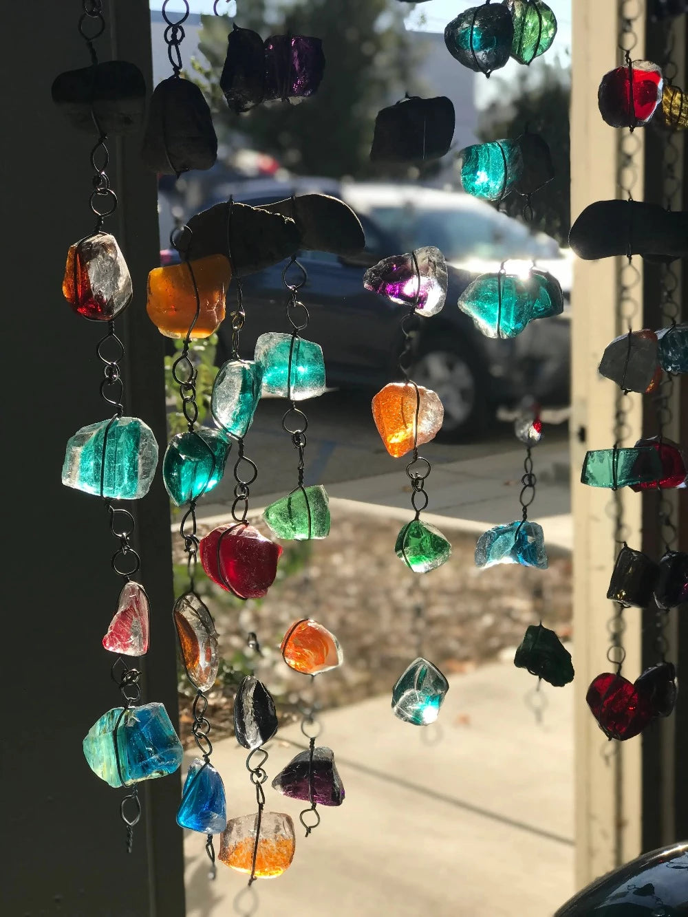 Recycled colorful rain chain made with rocks