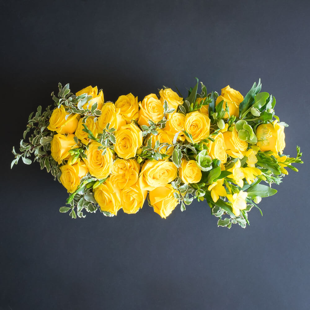 Yellow roses boutique floral arrangement