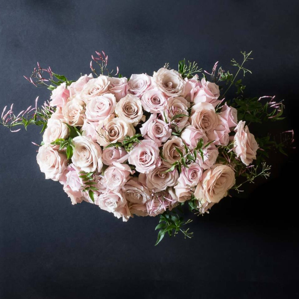 Boutique soft pink floral arrangement