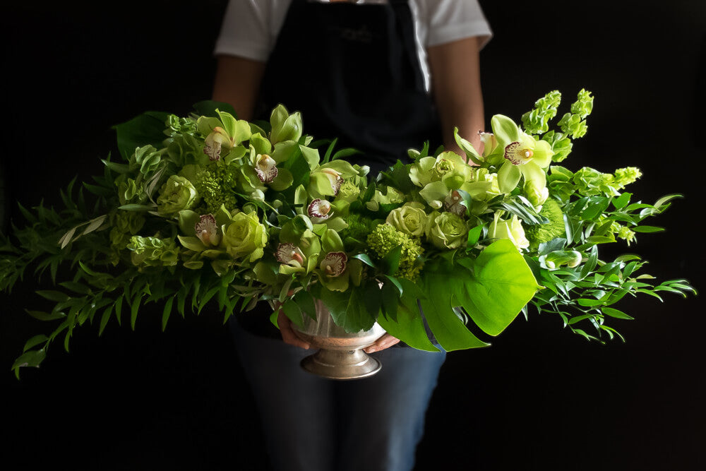 Green roses, green orchids, all green unique boutique floral arrangement