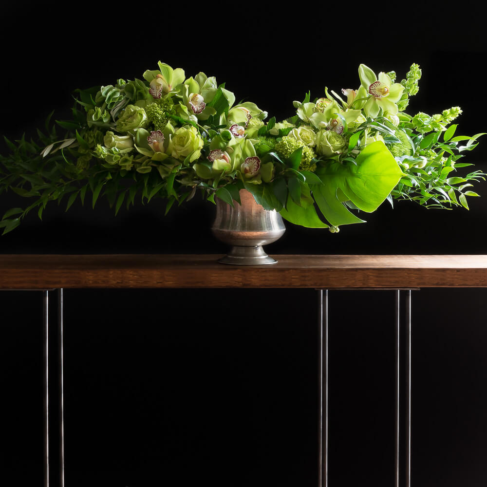 Green roses, green orchids, all green unique boutique floral arrangement